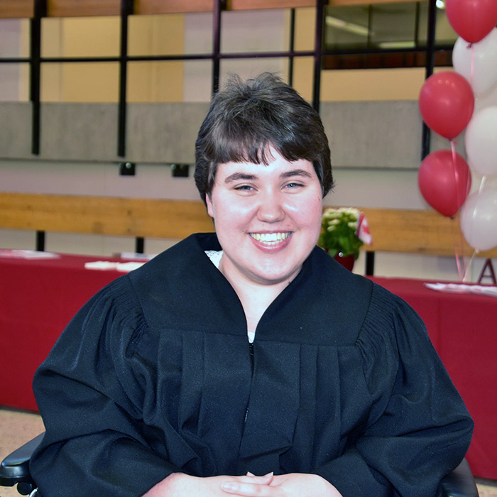 A girl in her graduation gown.